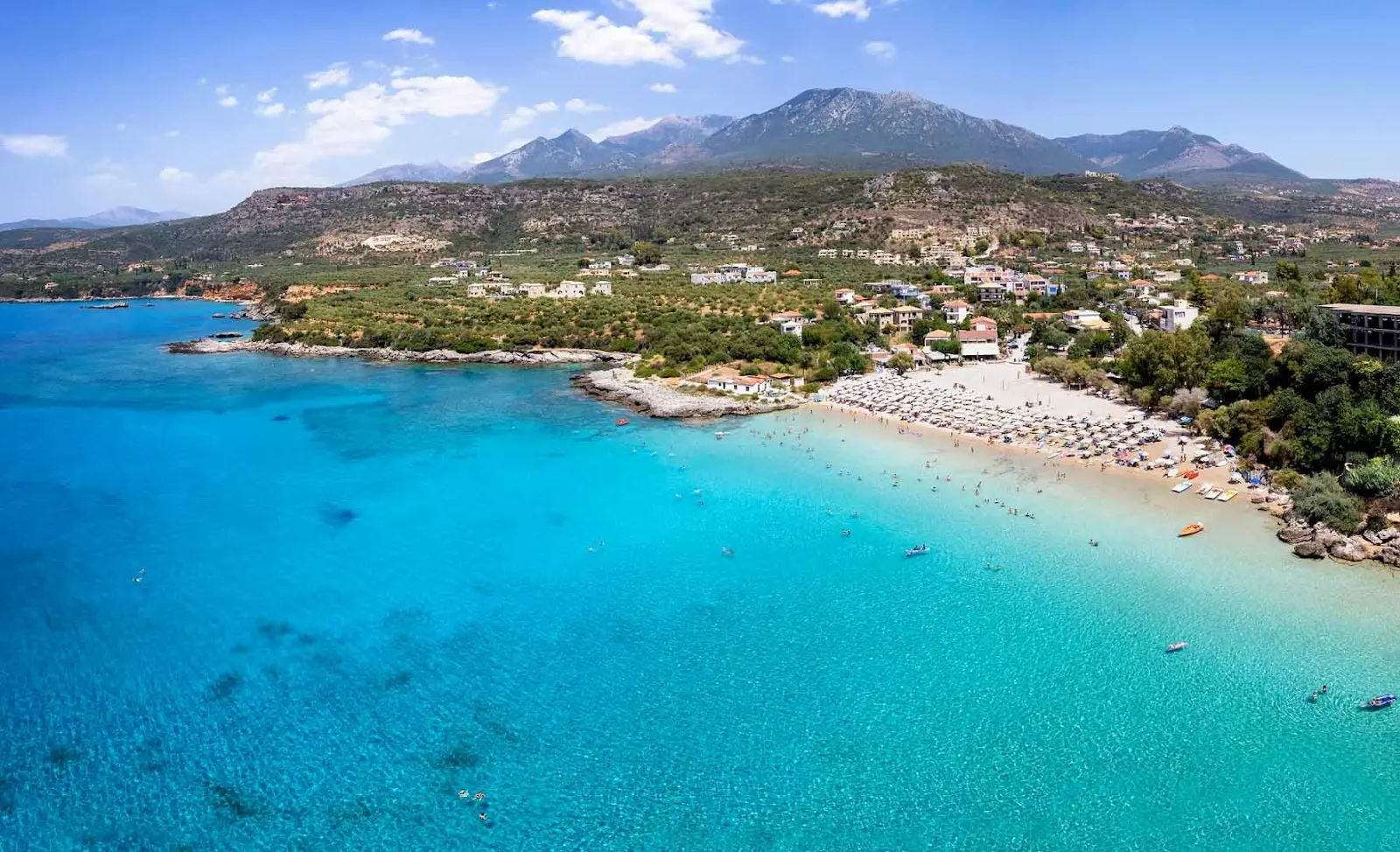 Stoupa Beach on the Mani Peninsula in Greece with mountains